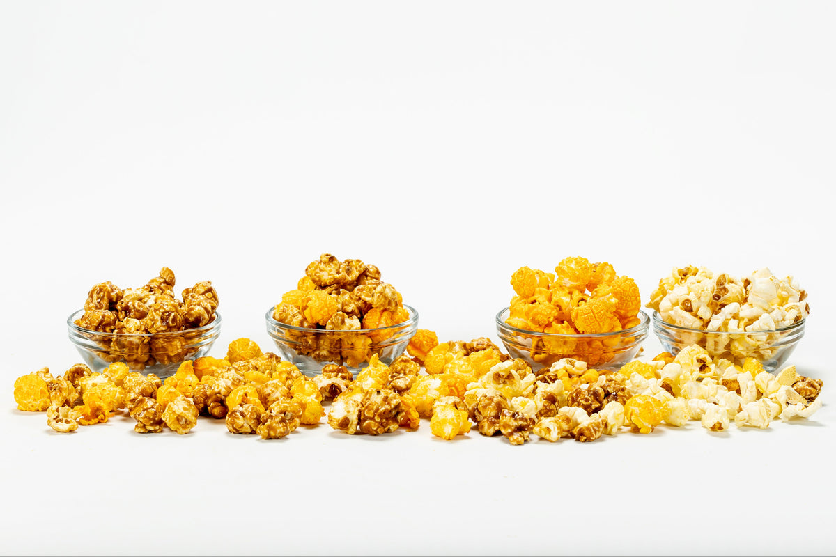 glass bowls with various flavors of scoops and kettle popcorn