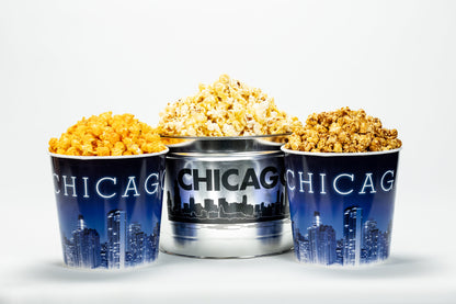Three containers of popcorn with 'Chicago' branding on a white background